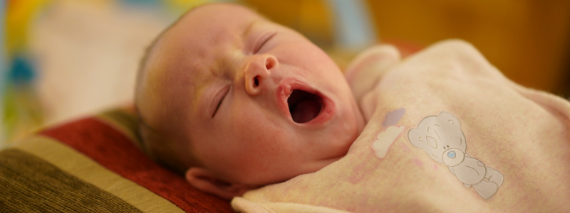 A baby yawning