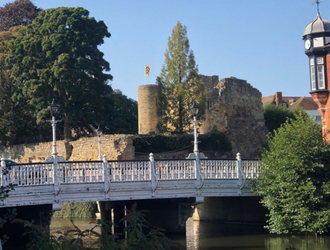 View of the castle over the river and bridge